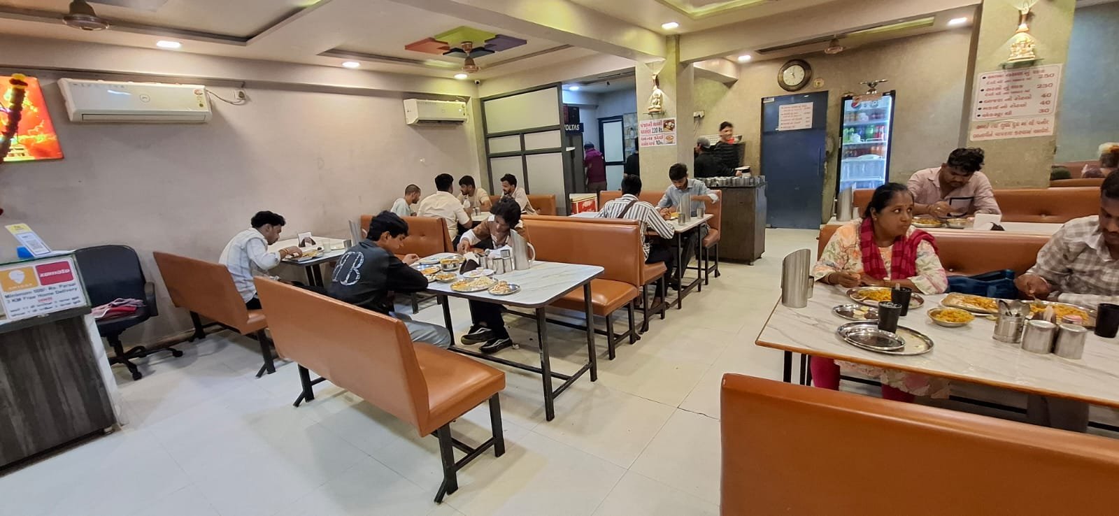 Guests dining at Jay Bhairavnath Punjabi Tadka